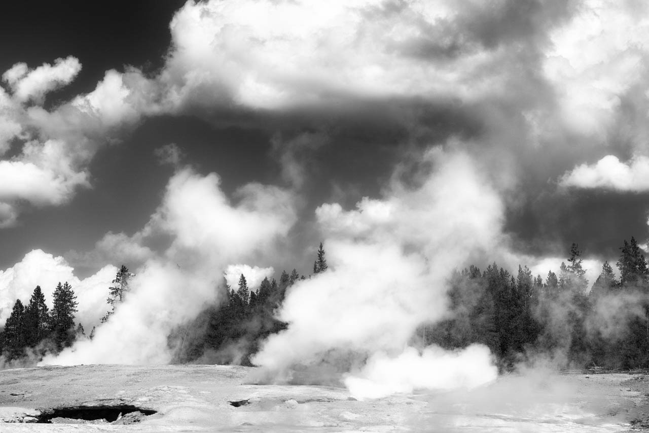 Geysers in Yellowstone at Norris Geyser Basin. Fine art Photograph in black and white by Amar Guillen, photographer artist.
