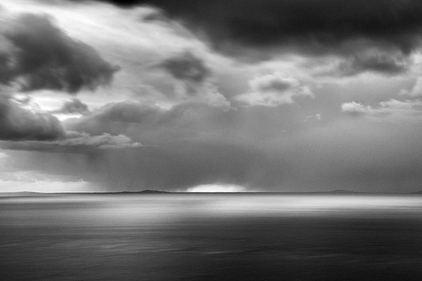 The Difference Between a Photographic Story, a Narrative and a Narration Seascape of Isle of Skye in Scotland in black and white.