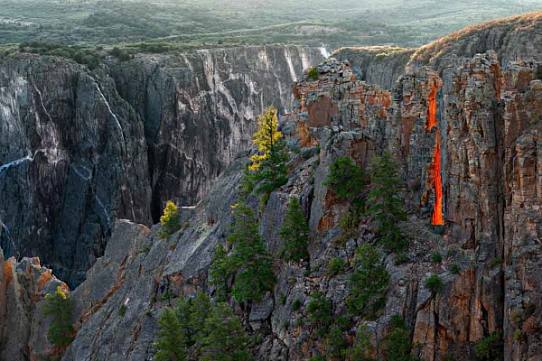 Why and How: Photographing the Dragon’s Tongue of Black Canyon The glowing red dragon's tongue of the Black Canyon in the state of Colorado in the United States. Photograph by Amar Guillen, photographer artist.