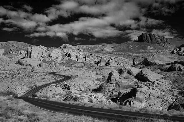 Why and How: Photographing the Valley of Fire in Nevada Black and white landscape of the road that winds through the Valley of Fire in Nevada. Photography by Amar Guillen, Photographer Artist